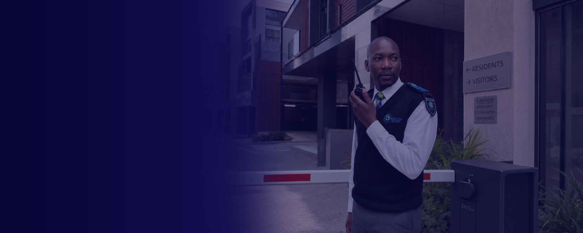 BidCop security officer managing access control at a gated entrance